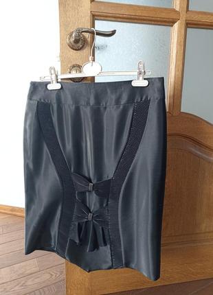 Красивая праздничная черная юбка с бантом2 фото