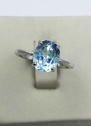Каблучка срібна з блакитним топазом 18 2,6 г