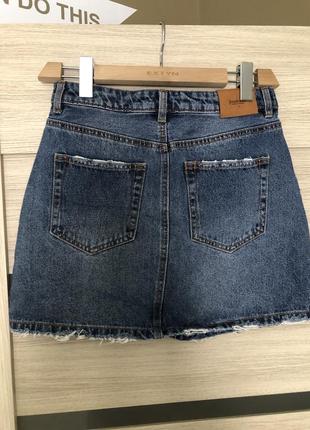 Джинсовая юбка рваная
