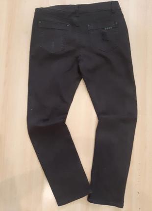 Женские черные джинсы1 фото