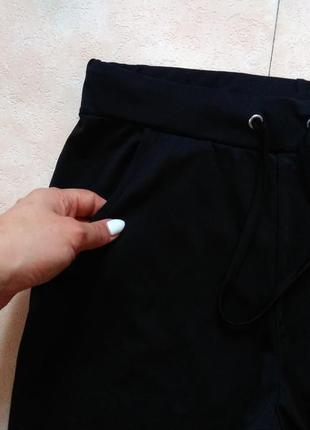 Спортивные эластичные черные штаны бойфренды crane, 36-38 размер.4 фото