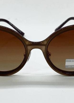 Cолнцезащитные очки женские овальные с поляризацией классика элегантные черные, коричневые, светло-коричневые6 фото