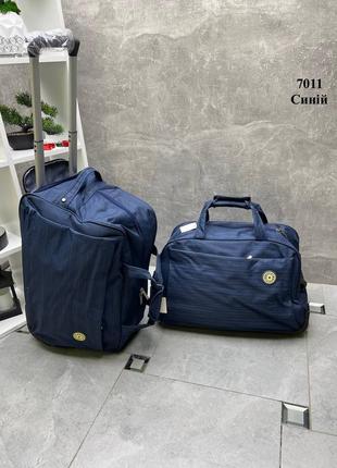 Стильна якісна практична універсальна сумка на колесах 2 розміри10 фото
