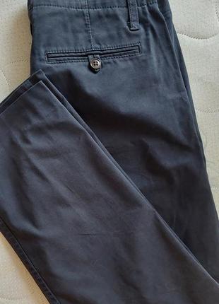 Укорочені джинси штани