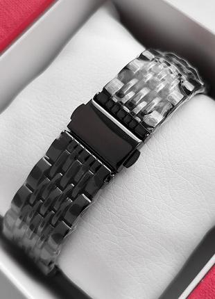Чорний наручний годинник для дівчат із циферблатом що обертається та камінчиками навколо4 фото