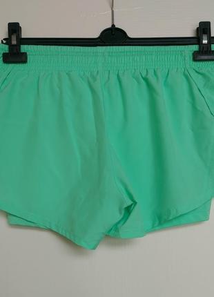 Шорты женские nike women's sports shorts 2 в 16 фото