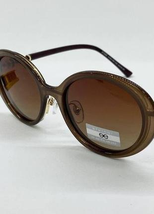 Cолнцезащитные очки женские овальные с поляризацией классика элегантные черные, коричневые, светло-коричневые1 фото