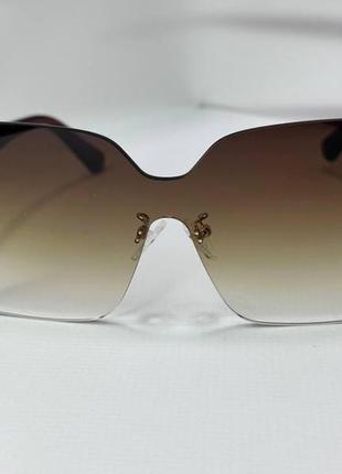 Очки солнцезащитные женские квадратные безоправные пластиковые дужки коричневый5 фото