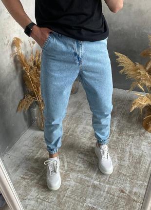 Чоловічі джинси на манжетах липучках