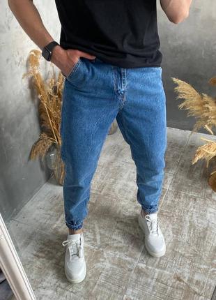 Чоловічі джинси на манжетах липучках