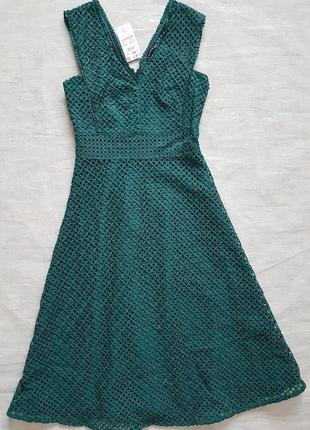 Красивое ажурное зеленое платье миди reserved без рукавов.3 фото