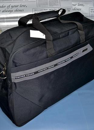 Дорожня сумка вместительная "travel" размер 62х24х381 фото