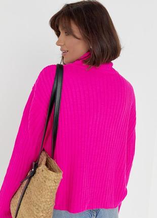 Жіночий оверсайз светр в рубчик з блискавкою на комірі8 фото