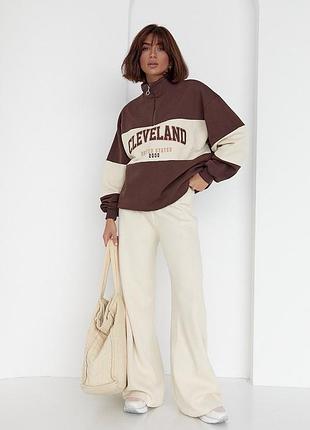 Світшот з блискавкою на горловині