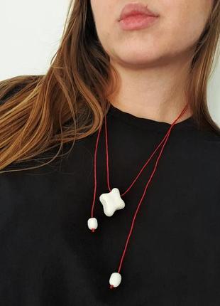 Глиняна прикраса ручної роботи