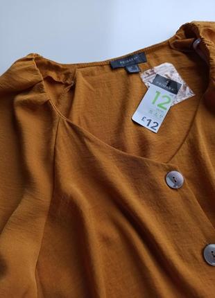 Красива стильна однотонна яскрава блуза гірчичного кольору з модним рукавом5 фото