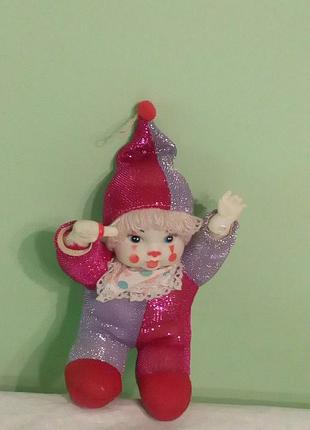 Іграшка м'яка лялька - арлекін з соскою