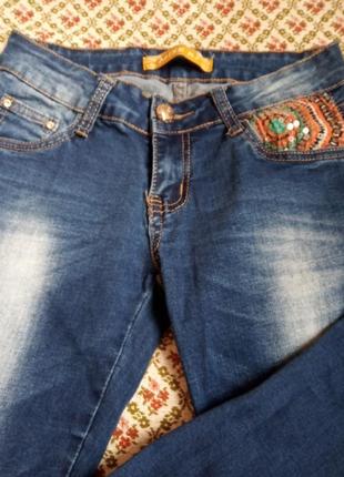 Оригінальні жіночі джинси.1 фото