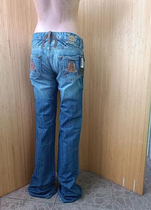 Дизайнерские джинсы с потертостями vivienne westwood6 фото