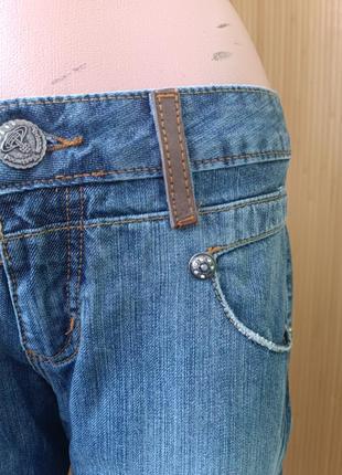 Дизайнерские джинсы с потертостями vivienne westwood3 фото