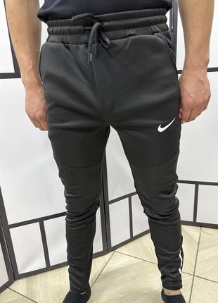 Чоловічі штани спортивні nike1 фото