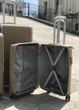 Качественный чемодан из полипропилен,модель 374,прорезиненный,надежная,колеса 360,кодовый замок,туреченя2 фото