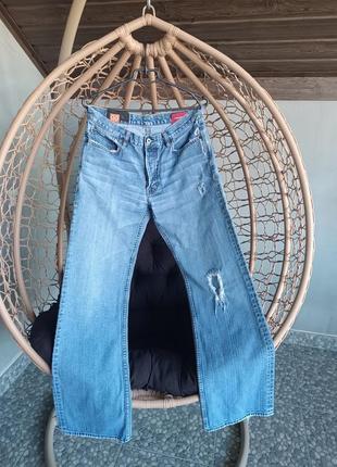 Стильні , фірмові джинси кльош ,іспанія1 фото