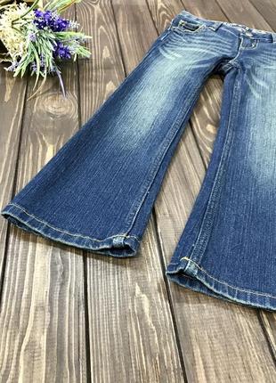 Розкльошені джинси на дівчинку 3-4 роки2 фото