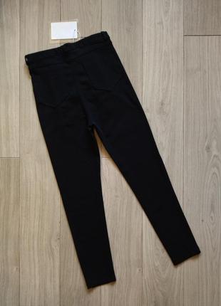 Жіночі джинси скінні укорочені з декоративною шнурівкою3 фото