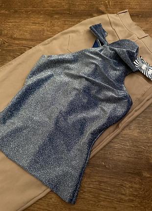 Асиметричний блискучий топ