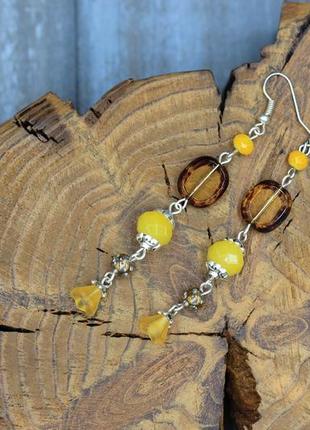 Довгі яскраві сережки