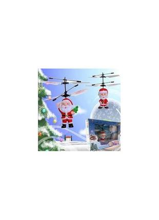 Іграшка літальний санта flying santa, що летить дід мороз3 фото
