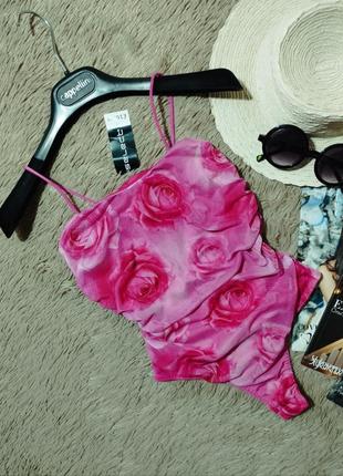 Гарний рожевий боді із сітки/комбінезон