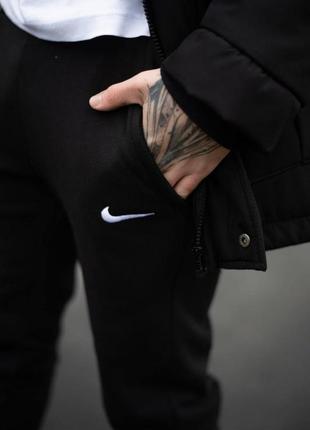 Чоловічі теплі спортивні штани nike3 фото