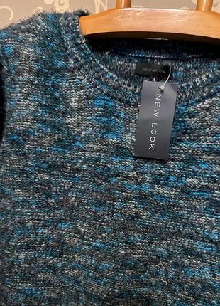 Очень красивый и стильный брендовый вязаный свитер.1 фото