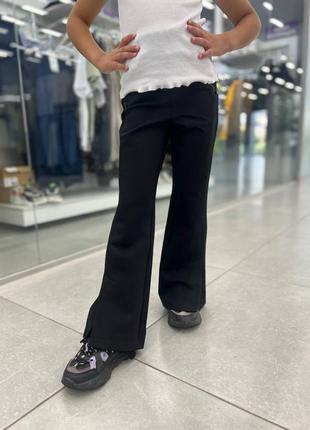 Брюки клеш
