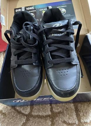 Кроссовки на колесах heelys