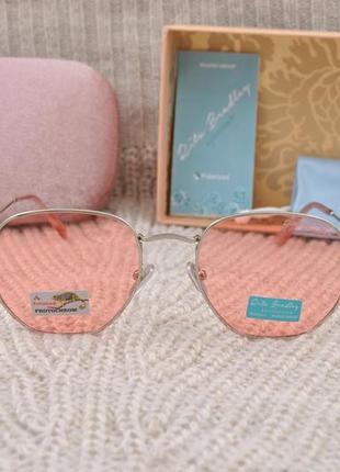 Фірмові сонцезахисні жіночі окуляри rita bradley polarized фотохромні хамелеон6 фото