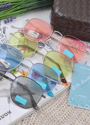 Фірмові сонцезахисні жіночі окуляри rita bradley polarized фотохромні хамелеон7 фото