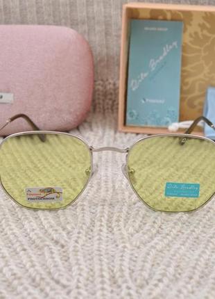 Фірмові сонцезахисні жіночі окуляри rita bradley polarized фотохромні хамелеон5 фото