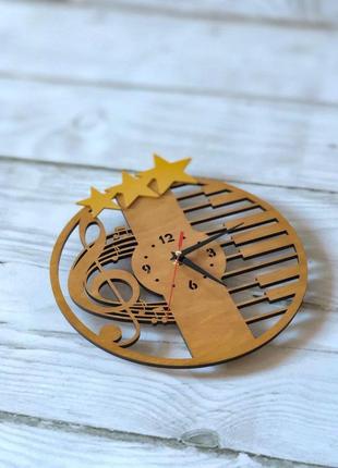 Часы деревянные "скрипичный ключ" с декором звезды 35 см1 фото