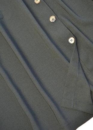 Стильная черная юбка миди с пуговицами ниже колен6 фото