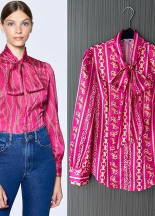 Розовая блуза с бантом