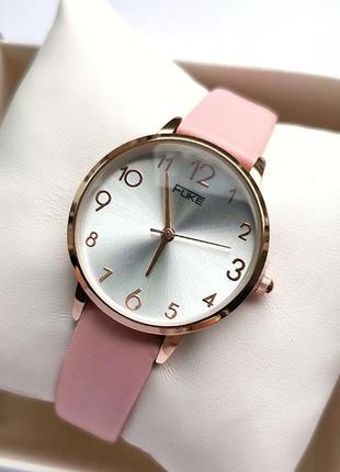 Красивий жіночий годинник fuke в класичному стилі, золотий корпус та рожевий ремінець