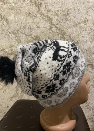 Зимова жіноча шапка1 фото