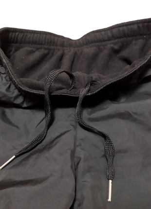 Женские зимние спортивные штаны на флисе anta fleece lining pants6 фото