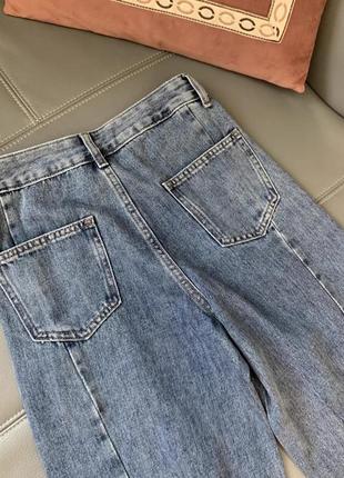 Голубые джинсы с молниями3 фото