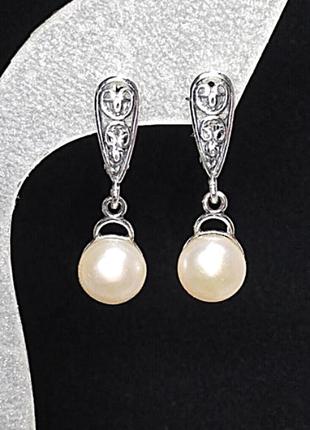 Срібні сережки з натуральними перлами кольору айворі1 фото