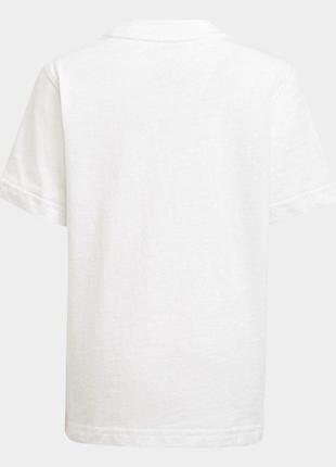 Хлопковая футболка с камуфляжным принтом и графикой adidas originals2 фото