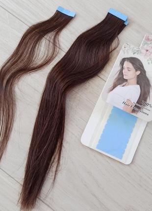 Натуральные волосы на липкой ленте.